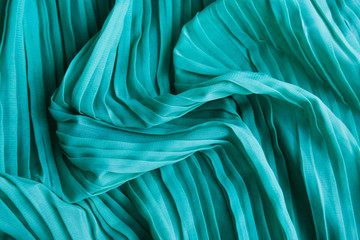 the texture of the mint pleated fabric. green georgette fabrics.