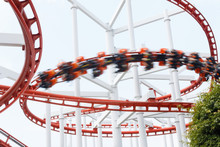 Roller Coaster Rail Loop With Motion Blur Player Over Cloudy Sky