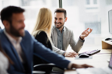 Sticker - Portrait of cheerful business couple working on computer