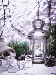 Wall Mural - Burning lantern and christmas decoration on white background