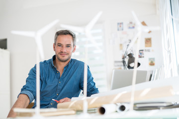 Wall Mural - Architect working on an ecological construction project