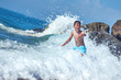 © Artem - Cute Caucasian boy in sea waves.