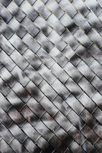 Metallic Silver Paint Covering Chain-link Fence