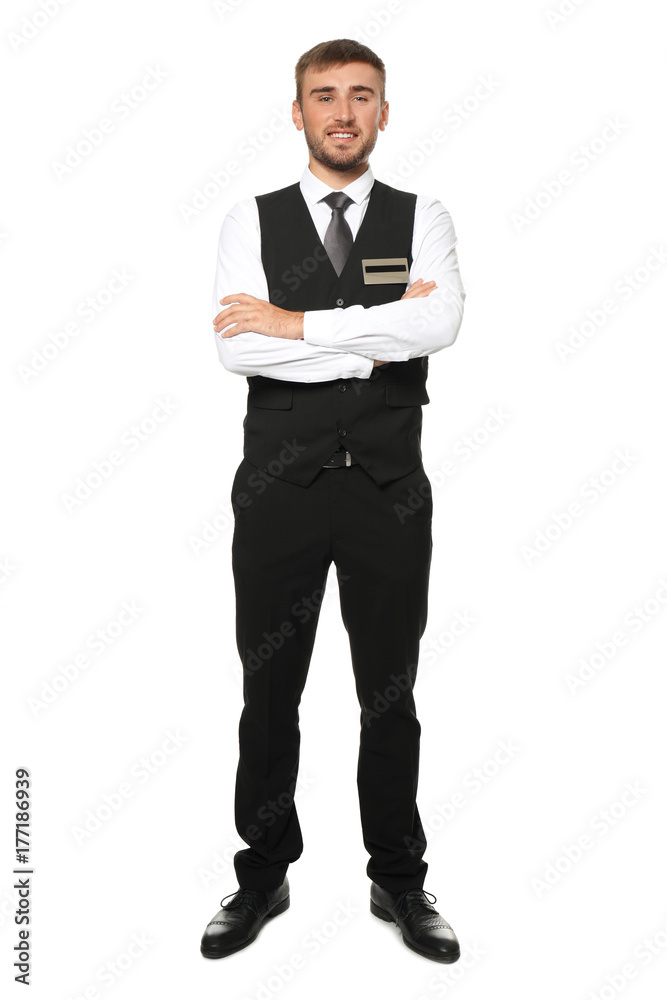 Male hotel receptionist in uniform on white background