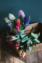 Spring Flowers In A Wooden Crate
