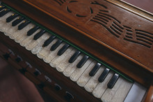 Close Up Of Harmonium Keys From Above.