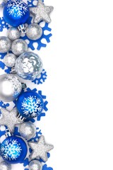 Wall Mural - Christmas border of blue and silver ornaments isolated on a white background