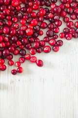 Poster - fresh cranberries on white wooden surface