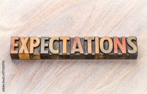 expectations word abstract in wood type Poster Mural XXL