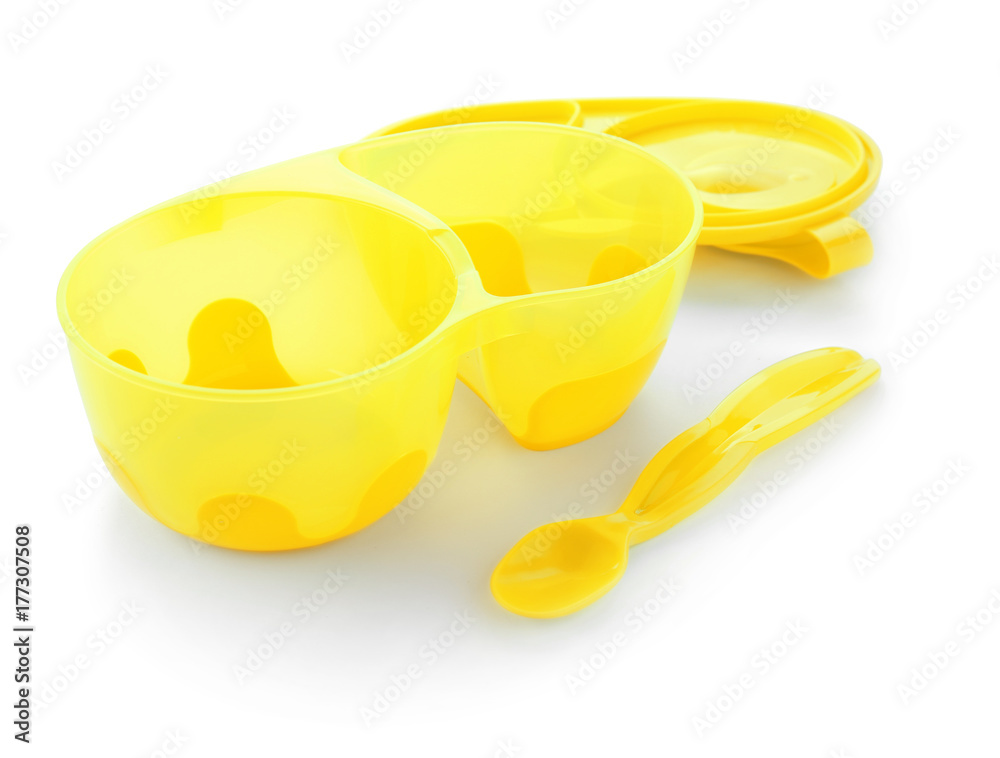 Bright baby tableware on white background