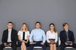 © Africa Studio - Group of people waiting for job interview on gray wall background