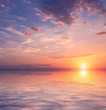 Beautiful sunset over calm water.