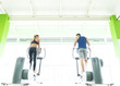 © realstock1 - The sportsman and sportswoman in the cardio apparatus