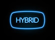 Hybrid  - colorful Neon Sign on brickwall