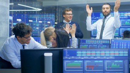 Poster - Multi-Ethnic Team of Stock Traders at the Stock Exchange Firm Office is Busy Selling and Buying Bonds and Shares. They Made Successful Deal and Celebrate.