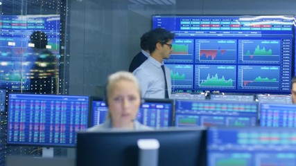 Poster - Stock trader Enters Office and Shakes Hands with a Colleague. Busy Office with Multi-Ethnic Team of Brokers, Dealers. Displays Show Numbers and Infographics.