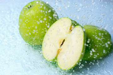 Apple with water splash