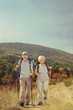 © Ljupco Smokovski - Two elderly hikers walking outside