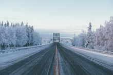 A Bridge In Alaska In December From The Middle Of The Road