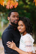© Kristen Curette Photography LLC/Stocksy - A portrait of a young African American couple outdoors in natural light