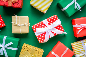 christmas and gift boxes on the green table