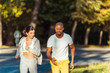 © LIGHTFIELD STUDIOS - couple running in park