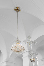 Elegant Chandelier On White Church Ceiling