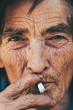 © Borislav Zhuykov/Stocksy - Senior Woman Smoking