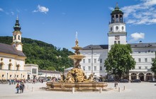 Residenz Square Church And Fountain In Salzburg, Austria