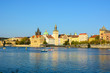 © kavunchik - Cityscape of Prague old town, its towers, Vltava river, Charles bridge, St. Francis of Assisi church. One of the most famous areas of Czech Republic capital