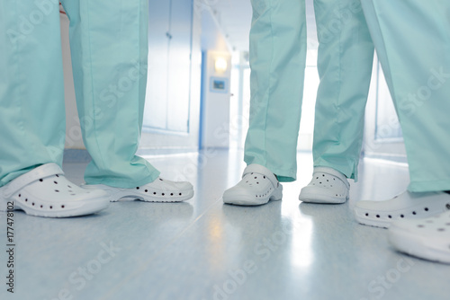 Cuadros en Lienzo close up shoes of medical team in hospital corridor