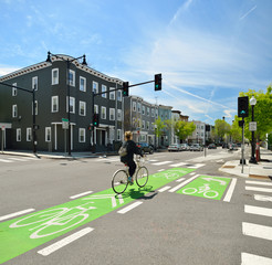 Clear Streat Signs And Markings On Protected Bike Lane