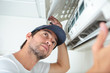 © auremar - fixing and maintaining air conditioning system