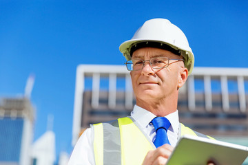 Wall Mural - Engineer builder at construction site