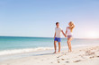 © Sergey Nivens - Romantic young couple on the beach