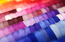 Multicolor Sewing Threads Background. Shallow Depth Of Field