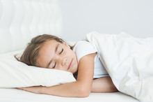 Beautiful Little Girl Sleeping In Bed