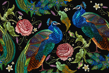 Wall Mural - Embroidery peacocks and flowers peonies seamless pattern. Classical fashionable embroidery beautiful peacocks. Fashionable template for design of clothes. Tails of peacocks and roses