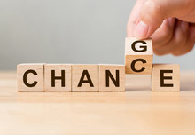 Hand Flip Wooden Cube With Word "change" To "chance", Personal Development And Career Growth Or Change Yourself Concept