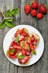 Wall Mural - Healthy breakfast-bruschetta with fruits