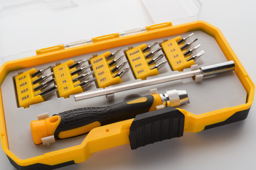 Interchangeable screwdriver set with different types of metal steel heads and bits