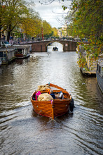 Wooden Boat In Amsterdam Canal, October 12, 2017