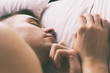 © KaroKatitca - Young man sleeping in bed