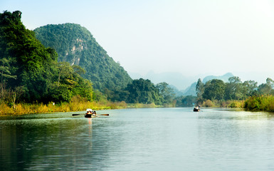 Traveling by boat on streams YEN in Hanoi, Vietnam.