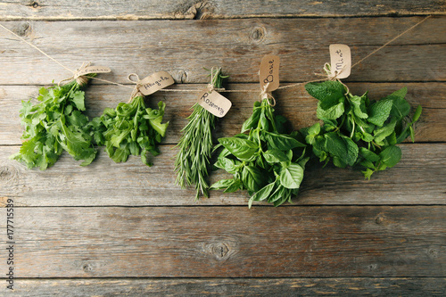 Fototapeta na drzwi i meble Different fresh herbs on wooden background