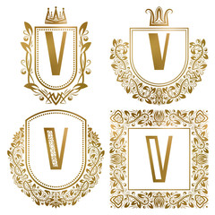 Poster - golden vintage monograms set. heraldic logos with letter v.