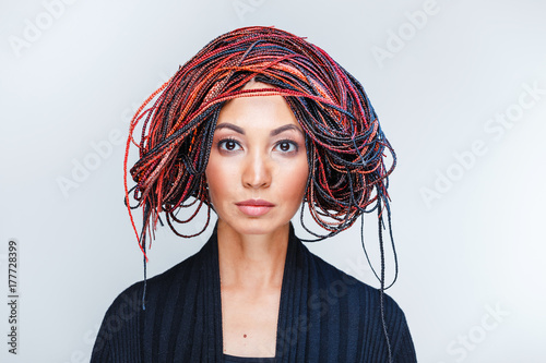 Fashion Studio Shoot Of A Mixed Race Woman With A Creative