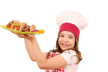 Wall Mural - Happy little girl cook with tacos