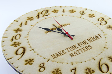 Wooden round wall watch - clock isolated on white background. Manage your time