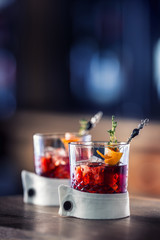 Sticker - Fresh cocktail drink with ice fruit and herb decoration. Alcoholic, non-alcoholic drink-beverage at the bar counter in the pub restaurant  or night club